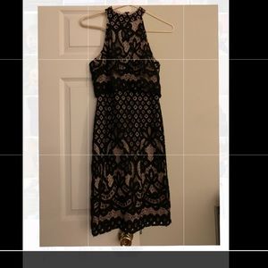 Black lace cocktail dress.